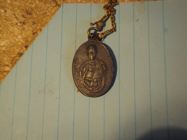 Luong Pau (Holy Medal in Hmong)