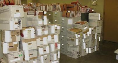Files in boxes on floor