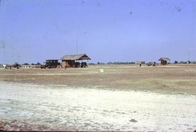 Chiang Mai Jan-Feb 1963 - From left > Duty truck - Maintenance Truck - Generator Shed - Squat Latrine - 3/4 - Operations Shed